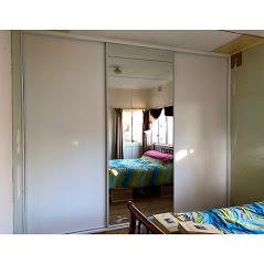 White framed, Two Glacier (white) vinyl doors/one Mirror door