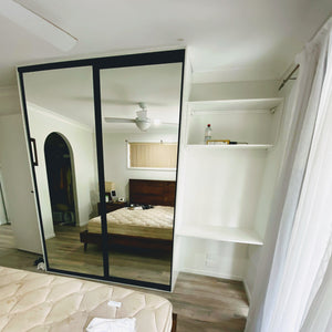 Black framed, mirror inserts wardrobe sliding doors & custom shelving