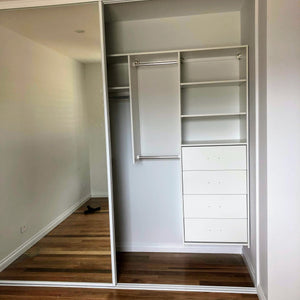 White framed, mirror doors & custom wardrobe shelving