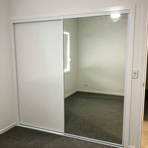 White framed, one Glacier (white) vinyl/one Mirror doors