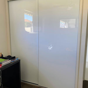 Chrome framed, pure white painted glass inserts, wardrobe sliding doors