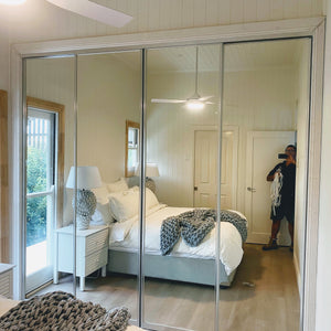 Chrome framed, mirror inserts wardrobe sliding doors