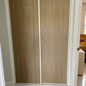 White frames, with Polytec Coastal Oak inserts, wardrobe sliding doors